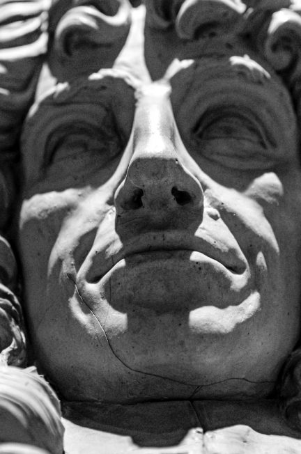 gray concrete statue of man